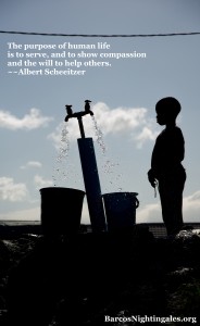 Silhouette of a young boy gathering water at a well in Langa, South Africa, a township located on the outskirts of Cape Town.